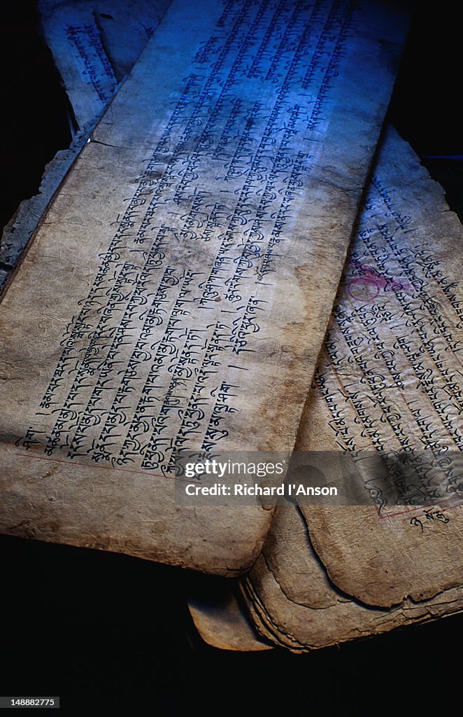 Pages of a Tibetan Buddhist prayer book in a private chapel in a house in Lo Manthang.