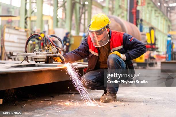 man controls the rail metal cutter - brandung bildbanksfoton och bilder