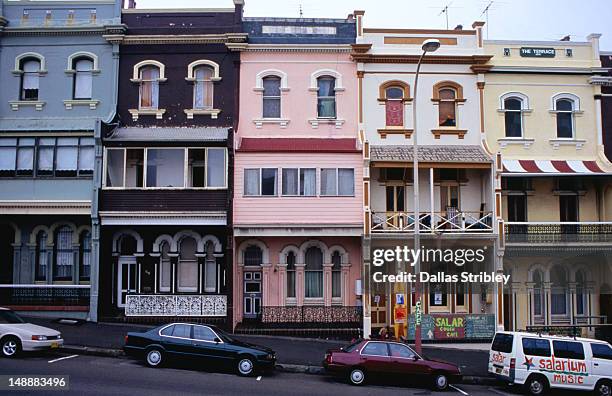 row of terrace houses in newcastle east. - newcastle new south wales stock pictures, royalty-free photos & images