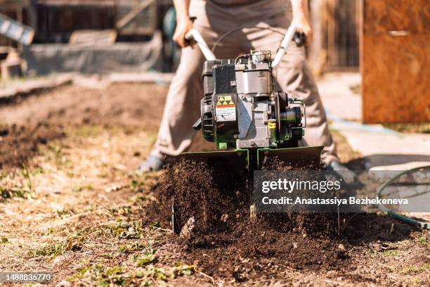 Rototilling Rototiller Photos and Premium High Res Pictures - Getty Images