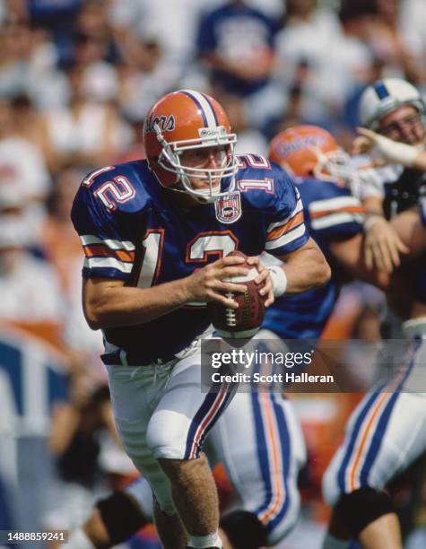 Terry Dean, Quarterback for the University of Florida Gators in motion running the football during the NCAA Southeastern Conference college football...