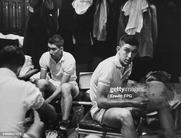 American tennis player Barry MacKay and American tennis player Donald Dell in the locker rooms of the United States National Indoor Championships,...