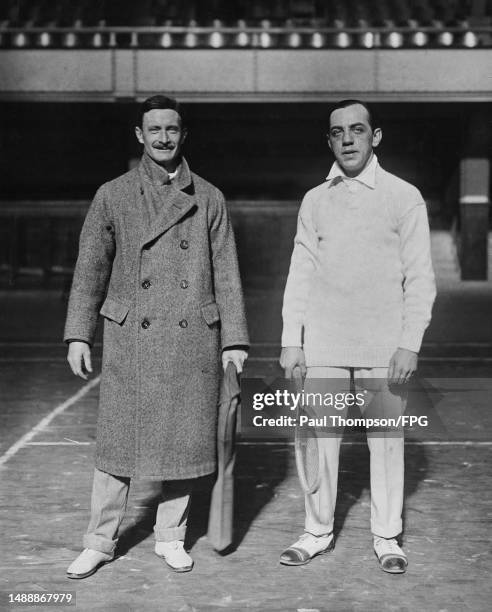 American tennis player Frederick B Alexander, wearing an overcoat, and American tennis player Dr William Rosenbaum in the men's doubles competition...