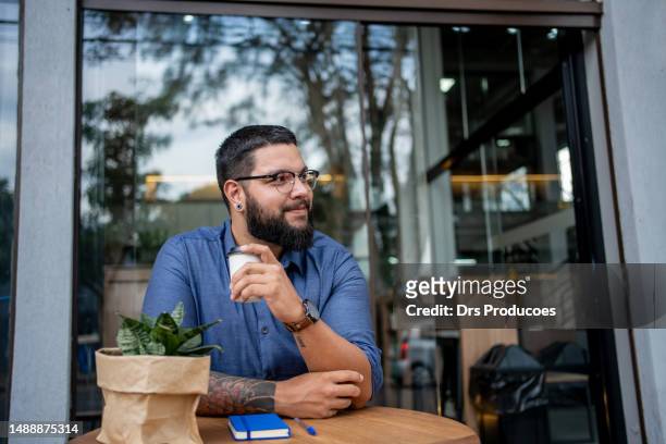 businessman having a coffee - obese man stock pictures, royalty-free photos & images