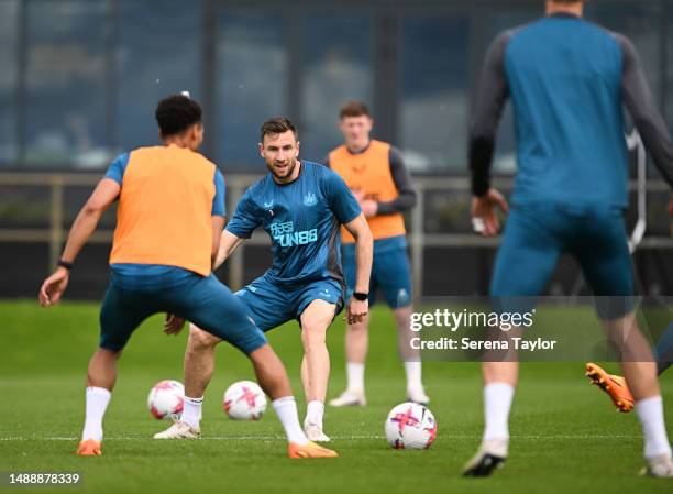 Paul Dummett passes the ball during the Newcastle United Training Session at the Newcastle United Training Centre on May 10, 2023 in Newcastle upon...