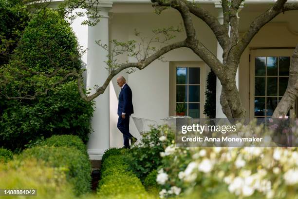 President Joe Biden departs the West Wing to board Marine One on the South Lawn of the White House on May 10, 2023 in Washington, DC. Biden is...