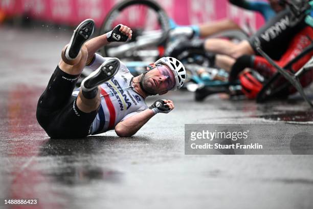 Mark Cavendish of The United Kingdom and Astana Qazaqstan Team after being involved in a crash in the final sprint at finish line during the 106th...