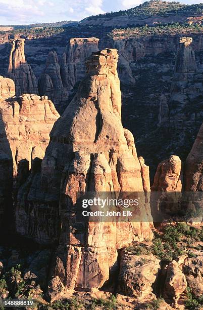 book cliffs and sunset light on pipe organ. - colorado national monument stockfoto's en -beelden