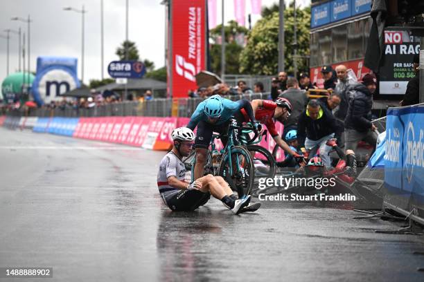 Mark Cavendish of The United Kingdom and Astana Qazaqstan Team after being involved in a crash in the final sprint and Gianni Moscon of Italy and...