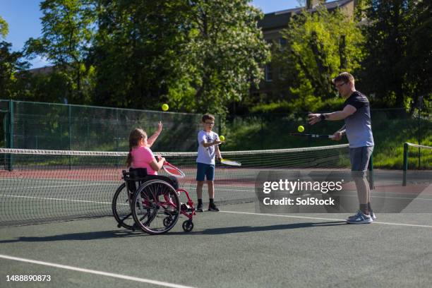 bouncing balls and having fun - bouncing tennis ball stock pictures, royalty-free photos & images