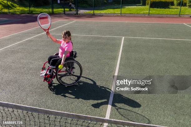 serving to an opponent - wheelchair tennis stock pictures, royalty-free photos & images