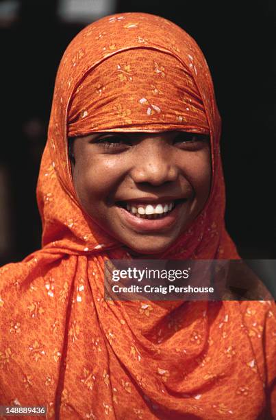 portrait of happy girl in bright muslim garb. - daily life in bangladesh stock pictures, royalty-free photos & images