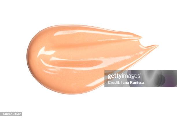 beautiful delicate pink, beige smear of bb face cream on white background isolated. tonal foundation is smudged. products for makeup and skin care. organic cosmetics. cosmetology. closeup. skin tone. - crème sucrée photos et images de collection
