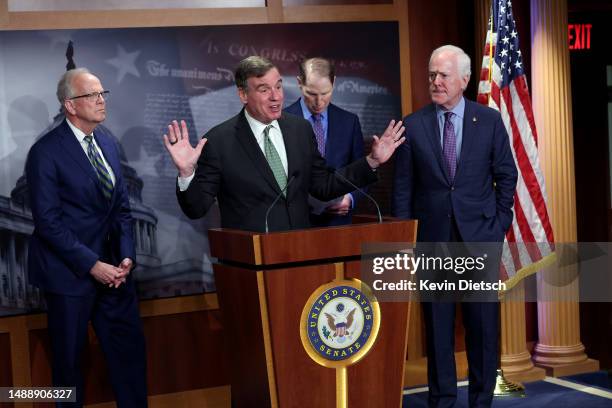 Sen. Mark Warner joined by Sen. Jerry Moran , Sen. Ron Wyden and Sen. John Cornyn speaks on security classification reform at the U.S. Capitol on May...