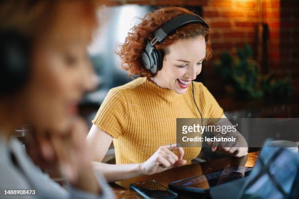 women discussing themes on a podcast from los angeles, california - los angeles press stock pictures, royalty-free photos & images