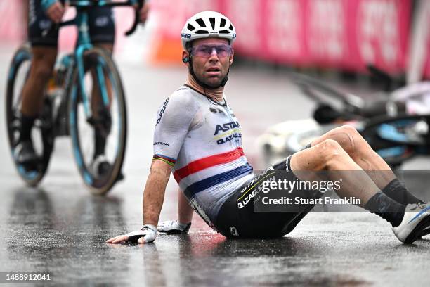 Mark Cavendish of The United Kingdom and Astana Qazaqstan Team after being involved in a crash in the final sprint at finish line during the 106th...