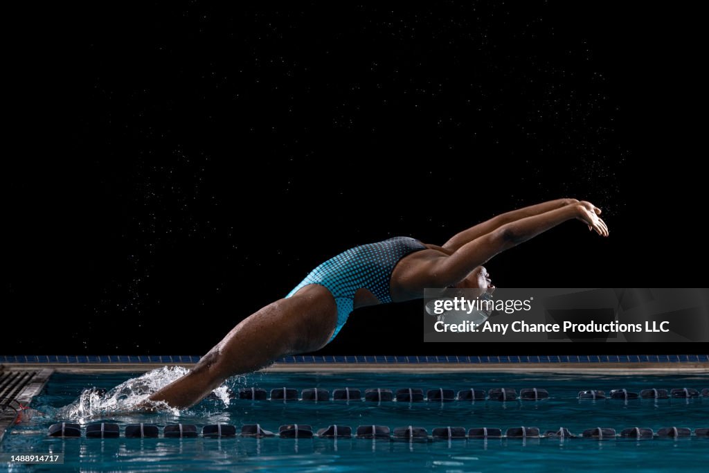 Backstroke Swim Racing Young Black Female Swimmer Starting The Backstroke High-Res Stock Photo ...