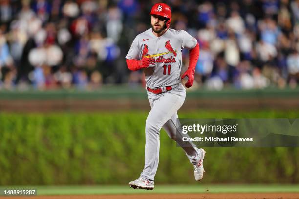 Paul DeJong of the St. Louis Cardinals rounds the bases after hitting a solo home run during the ninth inning against the Chicago Cubs at Wrigley...