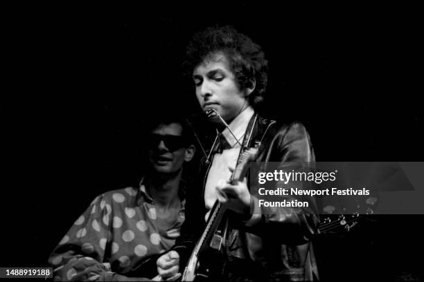 American singer, songwriter and folk icon Bob Dylan goes electric with the support of American songwriter, record producer and musician Al Kooper at...