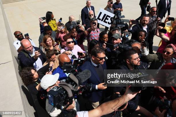 Rep. George Santos leaves Federal Court on May 10, 2023 in Central Islip, New York. Federal prosecutors in the Eastern District of New York have...