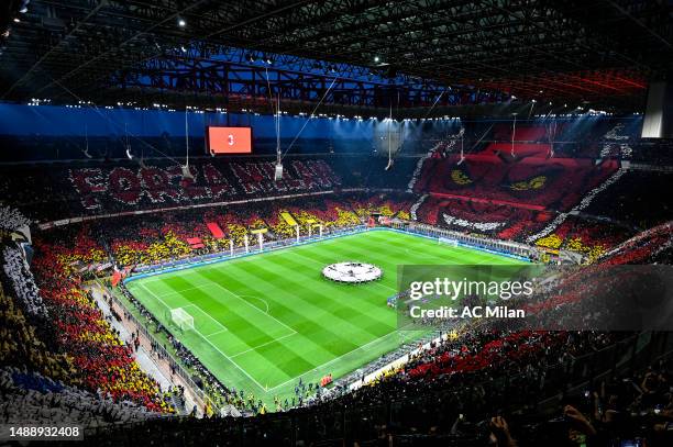 General view as fans of AC Milan create a TIFO during the UEFA Champions League semi-final first leg match between AC Milan and FC Internazionale at...