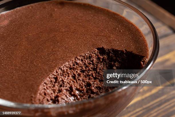 a transparent bowl with chocolate mousse,france - chocolate mousse stock pictures, royalty-free photos & images