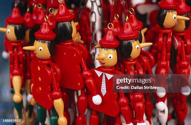 pinnochio dolls for sale in florence. - pinocchio stock pictures, royalty-free photos & images