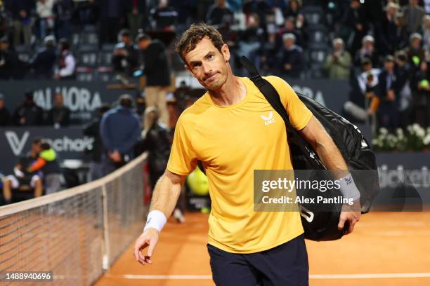 Andy Murray of Great Britain looks on following defeat against Fabio Fognini of Italy during the Men's Singles First Round match on Day Three of the...