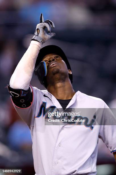 Jesus Sanchez of the Miami Marlins reacts after hitting a three run home run against the Arizona Diamondbacks during the fourth inning at Chase Field...