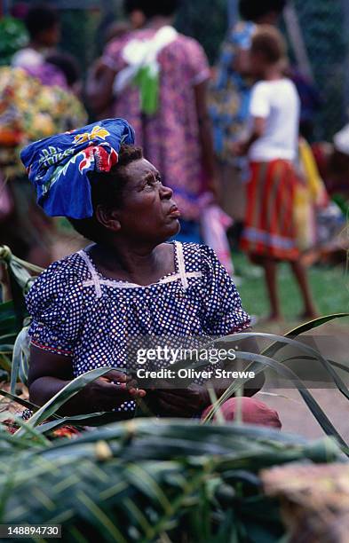 woman selling shellfish at rabaul market. - papua new guinea market stock pictures, royalty-free photos & images