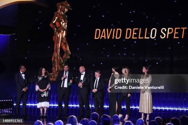 Host Carlo Conti with Antonella Attili, Massimo Venier, Aldo Baglio, Giacomo Poretti, Elena Lietti and Lucia Mascino receiving the David dello...