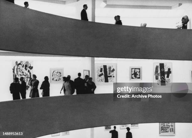 Guests at the private view for Fernand Léger's exhibition 'Five Themes and Variations' at the Guggenheim museum, New York City, 1962.