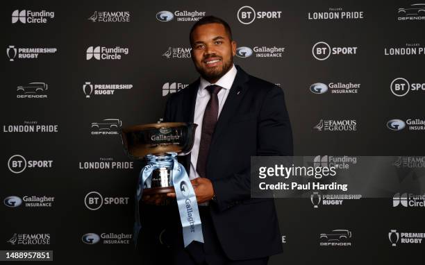Player of the Season winner, Ollie Lawrence of Bath Rugby poses with the trophy during the Premiership Rugby Awards at The Brewery on May 10, 2023 in...