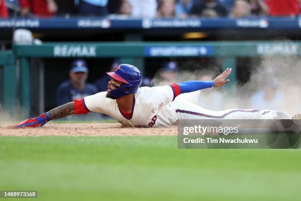 Edmundo Sosa of the Philadelphia Phillies scores the winning run to defeat the Toronto Blue Jays during the tenth inning at Citizens Bank Park on May...