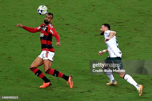 Fabricio Bruno of Flamengo fights for the ball with Sander of Goias during the match between Flamengo and Goias as part of Brasileirao 2023 at...