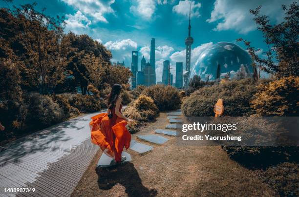 running for a magic world - shanghai tourist stock pictures, royalty-free photos & images