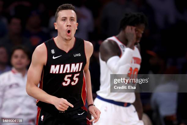 Duncan Robinson of the Miami Heat celebrates after making a three point basket against the New York Knicks during the fourth quarter in game five of...