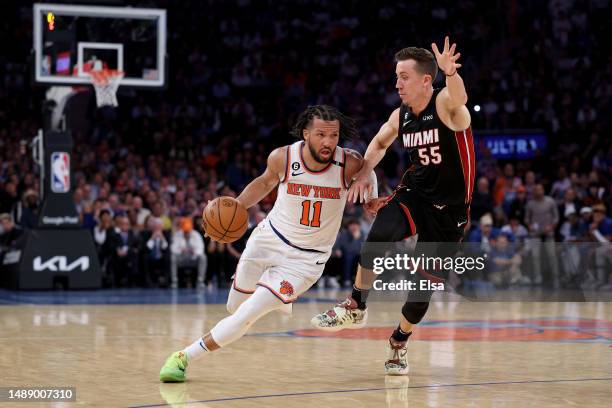 Jalen Brunson of the New York Knicks drives to the basket against Duncan Robinson of the Miami Heat during the fourth quarter in game five of the...