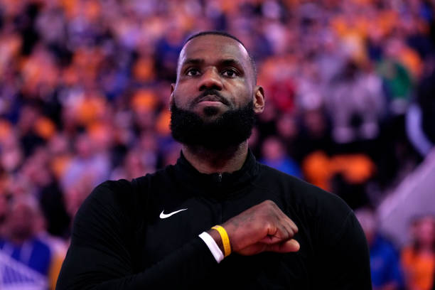 LeBron James of the Los Angeles Lakers looks on during the national anthem prior to facing the Golden State Warriors in game five of the Western...