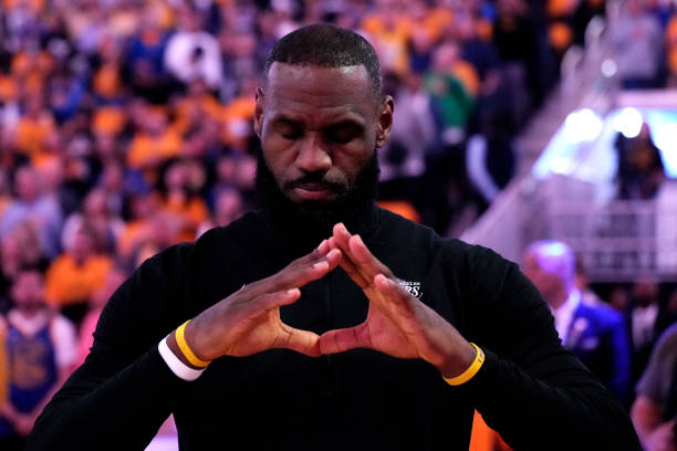 LeBron James of the Los Angeles Lakers looks on during the national anthem prior to facing the Golden State Warriors in game five of the Western...