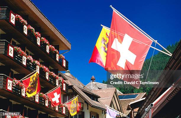 flag display, swiss national day. - wengen stock pictures, royalty-free photos & images