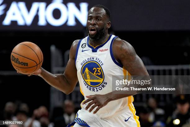Draymond Green of the Golden State Warriors brings the ball up court during the third quarter against the Los Angeles Lakers in game five of the...