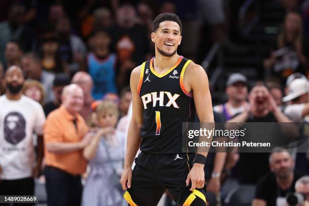 Devin Booker of the Phoenix Suns reacts during Game Four of the NBA Western Conference Semifinals at Footprint Center on May 07, 2023 in Phoenix,...