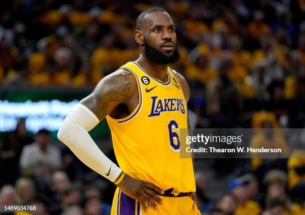 LeBron James of the Los Angeles Lakers looks on during the fourth quarter against the Golden State Warriors in game five of the Western Conference...