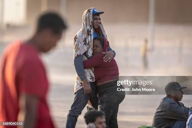 Immigrants wait for days in a makeshift camp located between the Rio Grande and the U.S.-Mexico border fence, hoping to be processed for asylum...