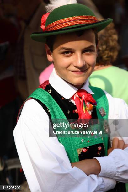 portrait of young girl in traditional dress during festa de ra bandes. - fiesta elegante stock-fotos und bilder