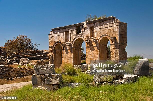 patara city arched gates. - patara stock pictures, royalty-free photos & images