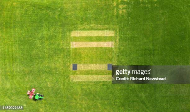 cricket pitch maintenance - double effort stock pictures, royalty-free photos & images