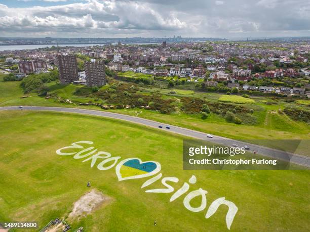 N aerial view of a giant mural of the Eurovision 2023 logo incorporating the Ukrainian flag adorns the dips at New Brighton on May 11, 2023 in...