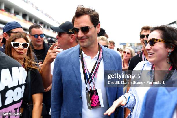 Roger Federer walks on the grid prior to the F1 Grand Prix of Miami at Miami International Autodrome on May 07, 2023 in Miami, Florida.